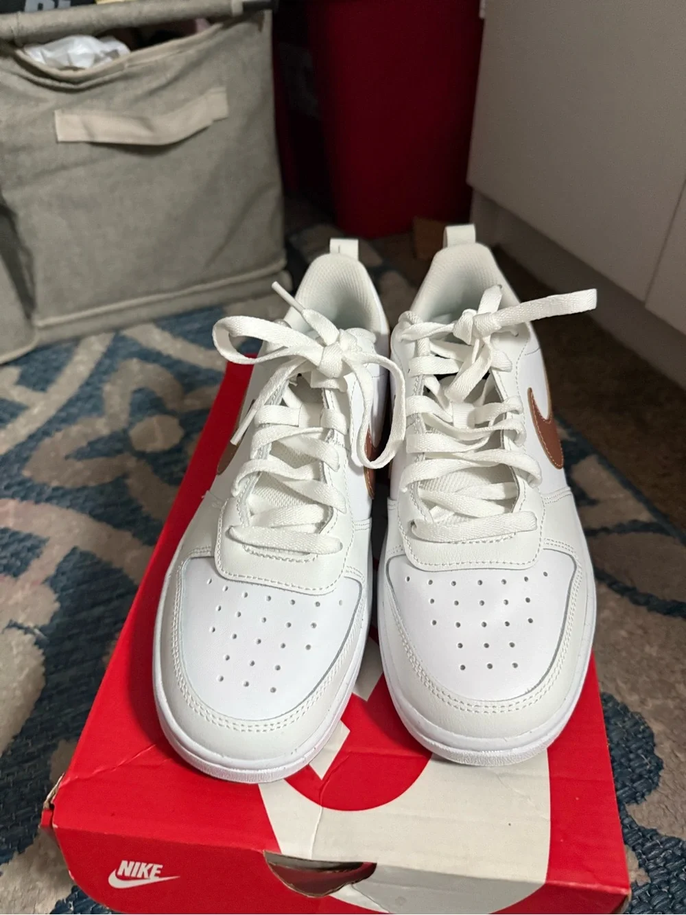 Nike Kids White Sneakers with Metallic Rose Swoosh